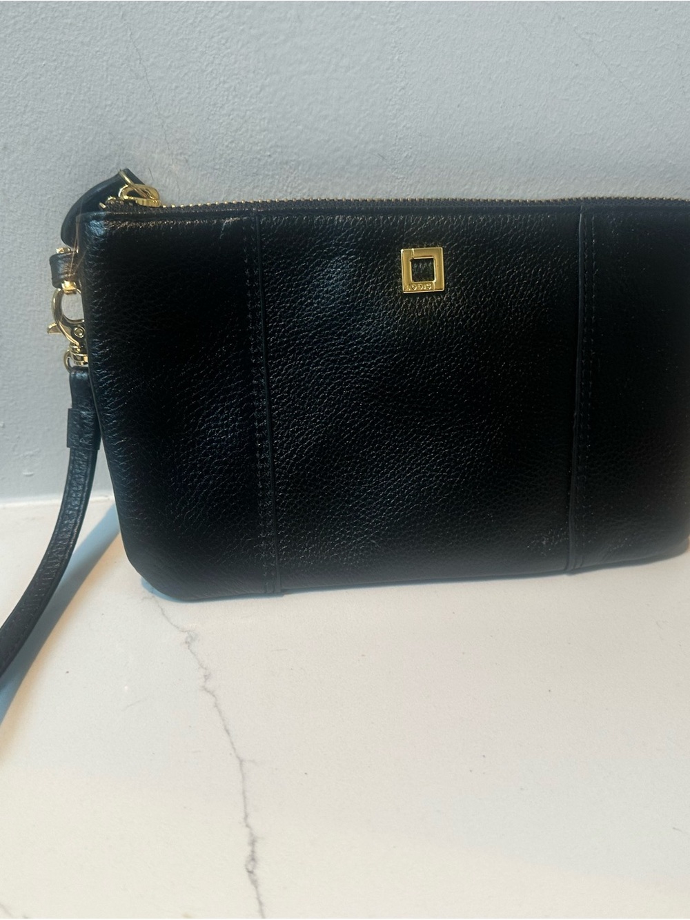 Lodis Black Leather Wristlet with Gold Hardware